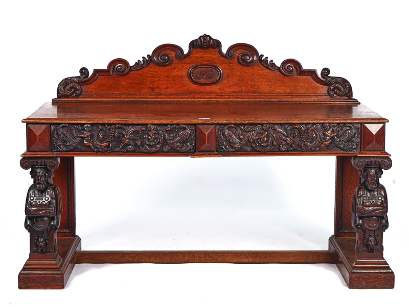 A VICTORIAN CARVED OAK SERVING TABLE