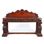 A VICTORIAN CARVED OAK SERVING TABLE