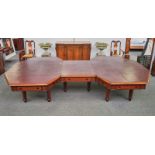 A LARGE MAHOGANY BOARDROOM TABLE