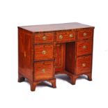 A 19TH CENTURY ROSEWOOD BANDED SATINWOOD BOWFRONT SIDEBOARD