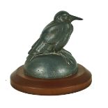 A PEWTER SCULPTURE OF A BIRD