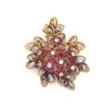 A GOLD, DIAMOND AND RUBY BROOCH