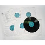 FIVE JIMI HENDRIX DOUBLE-SIDED 12" ACETATES AND A BLACK AND WHITE PHOTOGRAPH OF HENDRIX IN...