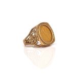 A 9CT GOLD MOUNTED HALF SOVEREIGN RING