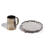 A SILVER WAITER AND A SILVER MUG, (2)