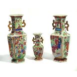 THREE CANTON FAMILLE- ROSE HEXAGONAL TWO-HANDLED VASES