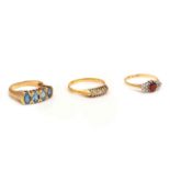 A GOLD AND DIAMOND FIVE STONE RING AND TWO FURTHER RINGS (3)