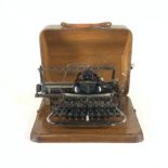 ‘BLICKENSDERFER’ AN EARLY 20TH CENTURY CASED TYPEWRITER No 7