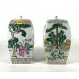 A NEAR PAIR OF EARLY 20TH CENTURY CHINESE FAMILLE ROSE DECORATED LIDDED VASES