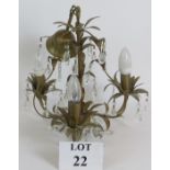 A contemporary three branch antique brass chandelier light fitting of foliate design and with cut