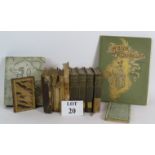 A collection of old and interesting books including a leather bound copy of Human Life,