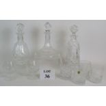 Three Waterford crystal Lismore decanters plus four Waterford tumblers and two Brandy balloons,