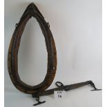 A large vintage Opus heavy horse harness collar with wooden frame and leather cushion trim (91cm x