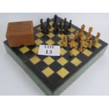 A scratch made vintage chess board box and a mismatched turned boxwood chess set in a vintage