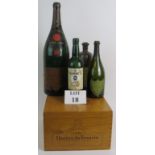 Four decorative empty vintage bottles including a Moet Et Chandon 1926 imperial sized bottle and a