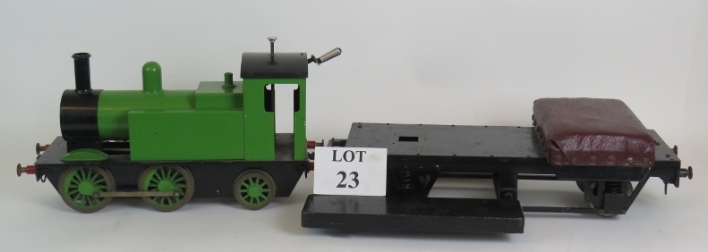 A professionally engineered scratch built mechanical steam locomotive with ride on tender.