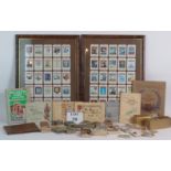 A collection of cigarette and tea collectors cards,