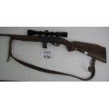 Anschutz West Germany 22 long rifle with magazine and golden antler scope, Serial No 1407170. (U.