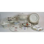 A collection of serving ware including M