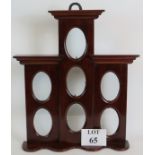 A 20th Century mahogany tiered picture f