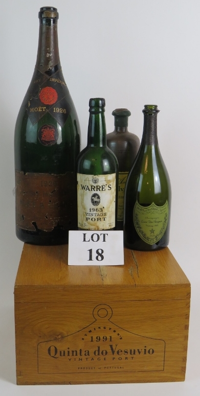 Four decorative empty vintage bottles in