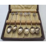 A set of six white metal Chinese teaspoo