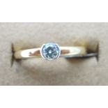 An 18ct yellow and white gold single sto