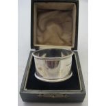 A plain silver napkin ring, Birmingham 1