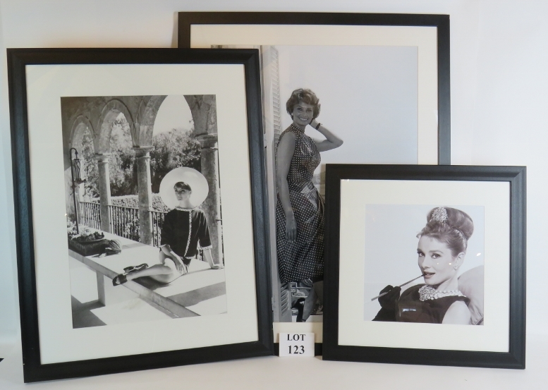 Three framed black and white photographi