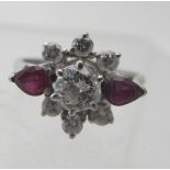 A white metal diamond and ruby cluster r