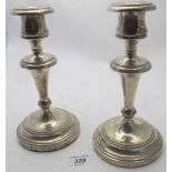 A pair of 925 stamped candlesticks, with