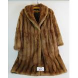 A vintage Arthur Shaw fur coat, probably