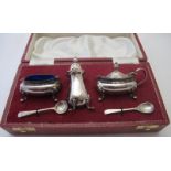 A three piece silver condiment set, to i