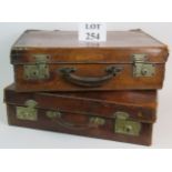 Two early 20th Century leather suitcases