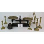 A set of cast iron and brass weighing scales with graduated imperial weights and three pairs of