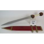 A reproduction Roman Gladius sword with red leather scabbard and wood and resin hilt.
