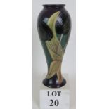 Moorcroft pottery black tulip pattern tall vase with date mark for 1991. Height: 28cm.