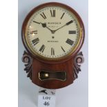 A mahogany cased late 19th Century wall clock by H. Manger 116 High St Borough.