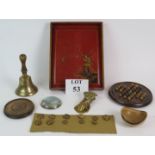 A selection of collectables including a bronze hand bell,