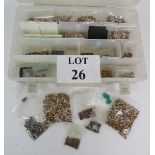 A box containing a large and varied selection of hand carved Swarovski Crystals of various colours