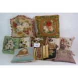 Eleven tapestry cushions of various design mostly with velvet backs. Largest: 42cm x 42cm. (11).