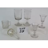 Four 19th Century drinking glasses a small three part moulded cup and an early 19th Century gilt