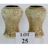 A pair of Art Nouveau Bretby Pottery Clanta vases with incised marks to base. Height: 16cm.