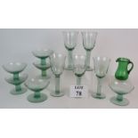 A set of six green recycled glass stemmed dessert bowls,