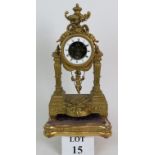 A 19th Century Ormolu metal French swinging Cherub clock by Eugene Farcot (1830-1896) on