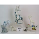 Two hand decorated pottery cats by Rye artist David Sharp, a Rye pottery cat, a Beswick cat,