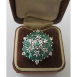 An emerald and diamond hexagonal cluster