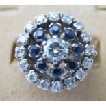 A diamond and sapphire cluster ring, cla