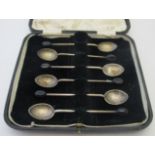 A set of six silver coffee spoons with c