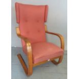 A vintage 1960's 36/401 wingback lounge